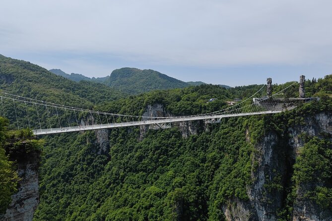 3-Day Zhangjiajie Panoramic Highlights Tour - Day 2: Glass Bridge thrills and Yellow Dragon Cave’s 3 layers and 13 halls