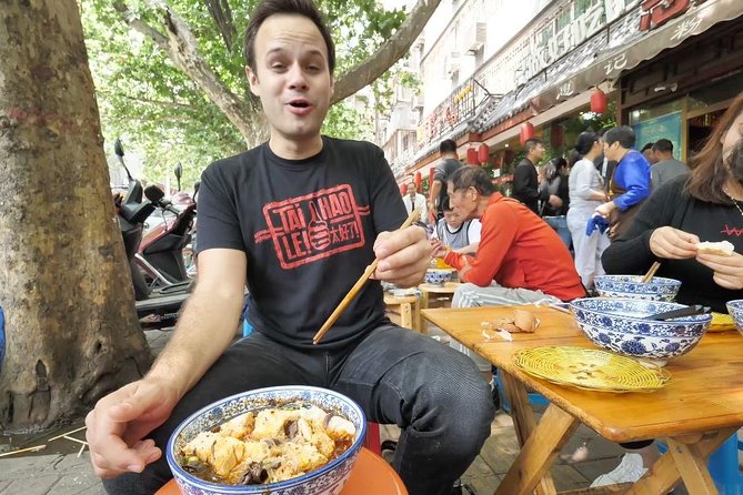 3-Hour Private Night Tour: Beijing Foodie Experience - Yunnan cuisine stop: flower cakes, plum liquor, and the noodles that travel