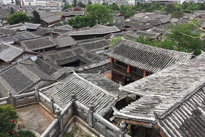 8-Day Private Yunnan Tour to Kunming, Dali, Lijiang and Shangri-La - Day 5: Baisha Murals, Jade Dragon Foot Area, Black Dragon Pool, and Dongba Culture
