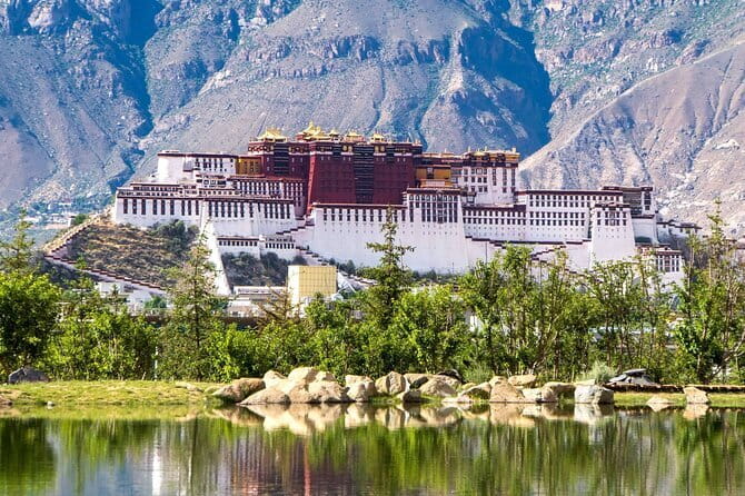 8 Day Tibet Classic Tour - Namtso Lake on the Qinghai-Tibet Highway, prayer flags and the high pass vibe