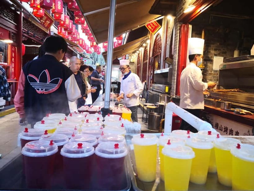 Authentic Old Xi'an Back Alley Food Tour - What you do not want to miss: the cooking process and the seating rhythm