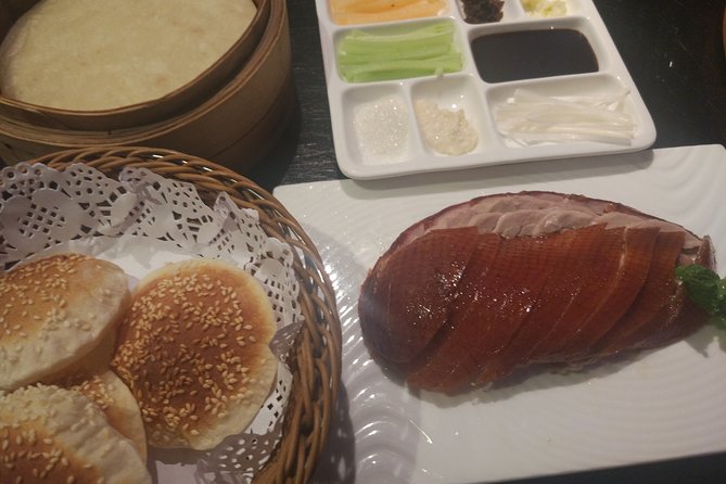 Beijing Evening Tour: Chaoyang Acrobatic Show with Peking Duck Dinner - Entering the evening plan: acrobatics first, duck second (or the reverse)