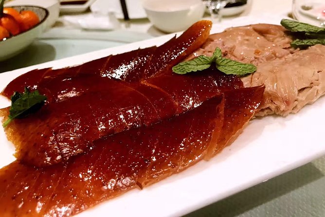 Beijing Evening Tour: Chaoyang Acrobatic Show with Peking Duck Dinner - Price and logistics: what you are paying for at $138 per person