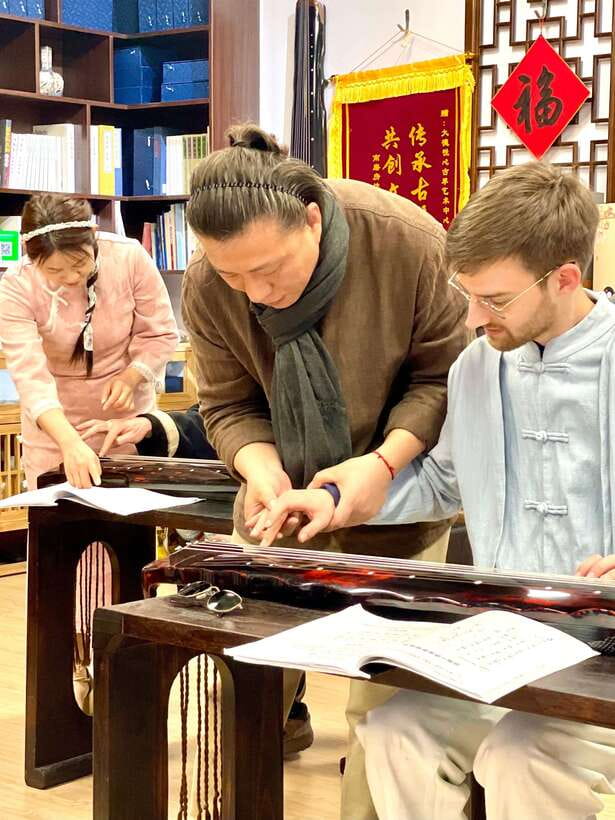Beijing Hands-On Culture Tour: Tea, Instrument, Calligraphy - A 3-hour shortcut to tea, Guqin, and calligraphy