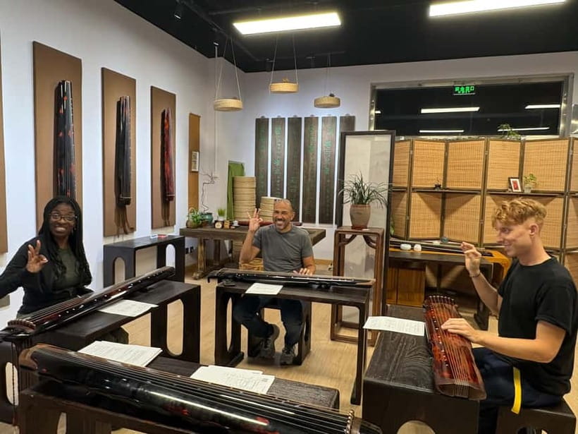 Beijing Hands-On Culture Tour: Tea, Instrument, Calligraphy - Hanfu dressing and photos, without turning it into a costume-only moment