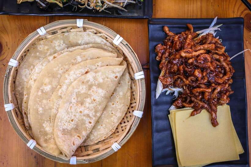 Beijing: Hidden Gems Guided Food Tour with Beer and Tastings - Beijing hotpot with craft beer and bell-tower views