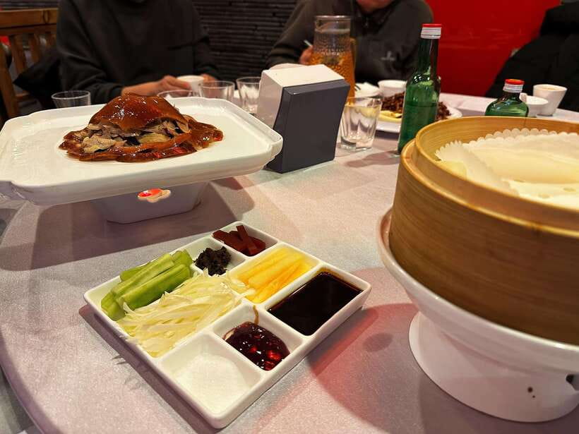 Beijing Hutong Food Crawl Delights: Peking duck, Hotpot&More - Yunnan-style cross-bridge rice noodles: broth depth and a sweet finish