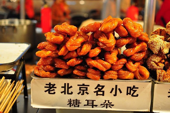 Beijing Private Hutong Food Walking Tour - Stop 1: Dongsi Hutong, where architecture and snacks share the same lanes