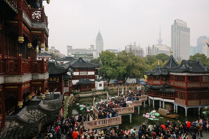 Best of Shanghai Day Tour, including Jade Buddha Temple & Bund & Yuyuan Garden - People’s Square to Jade Buddha Temple: quick green break, then a spiritual stop