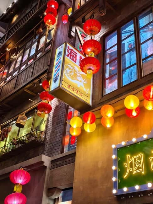 Chongqing: Trendy Spots, Cableway & Ferry Private Tour - Longmenhao Old Street: restored history with tea-and-trends energy
