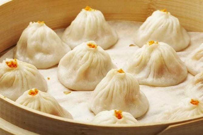 Din Tai Fung Dinner and VIP Class River Cruise Experience in Shanghai - From your hotel to the Bund: a smooth start