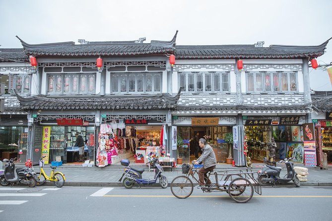 Early Bird Shanghai Street Breakfast Tour And Visit Fabric Market - Yu Garden area and the tea ceremony break you will remember