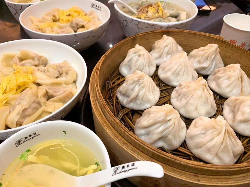 Evening Food & Drink Tour in Former French Concession - What you’ll eat: street bites, signature dishes, and shared samples