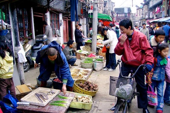 Explore Shanghai Ancient Downtown with Authentic Local Food - Pedaling past General Zhou Enlai and Xichengli: the Shikumen lanes up close