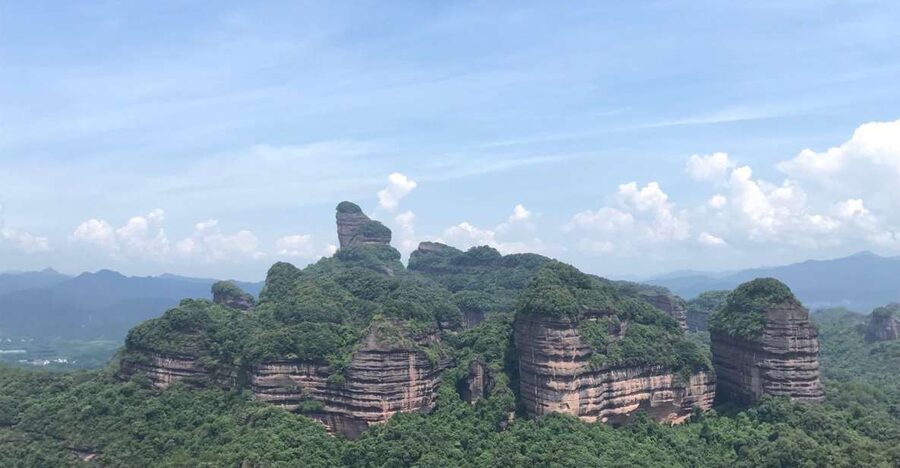 From Guangzhou: Mount Danxia and Nanhua Temple Full-Day - Scaling Danxia Mountain’s Zhanglao for red-rock views