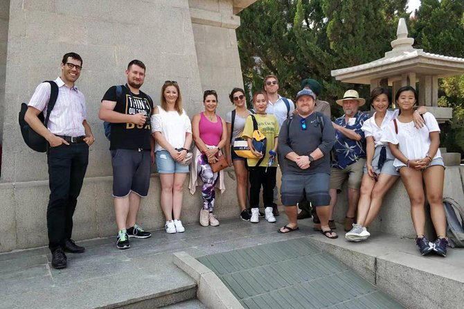 Group Bus Tour to Terracotta Warriors with Hotel Pickup & Lunch - Hotel pickup in Xi’an: the day starts with logistics