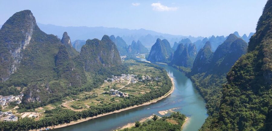 Guilin: Li River Cruise with Buffalo and Tour of Yangshuo - Guides in action, why a private day feels easier