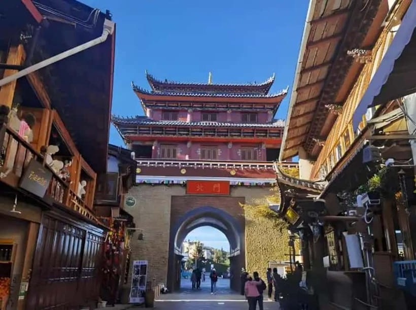 Lijiang to Shangri-La HuXiang Road Private Scenic Tour - Dukezong Ancient Town in Shangri-La: prayer flags and stone streets
