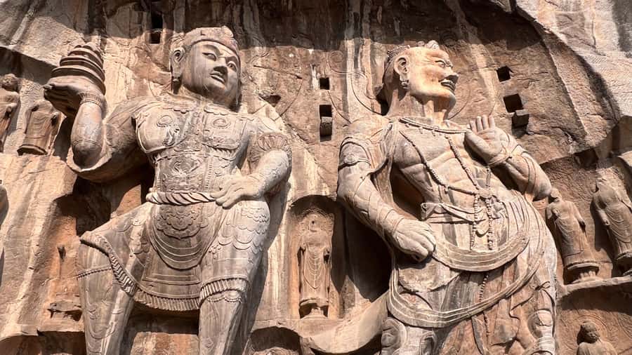 Luoyang: Day tour from Xian or LuoYang with tickets options - Longmen Grottoes: stone carving, big scale, and smart pacing