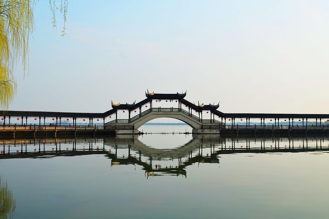 Mini Group: One-Day Zhouzhuang and Jinxi Water Town Tour - Zhouzhuang morning, 9:30 to 11:30: black tiles, white wells, and canal life