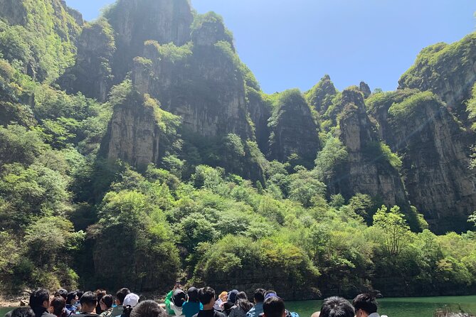 Private Day Tour to Longqing Gorge and Dingling at the Ming Tombs with Lunch and Boat Ride - Longqing Gorge: Flying Dragon escalator and a real boat ride on blue-green water