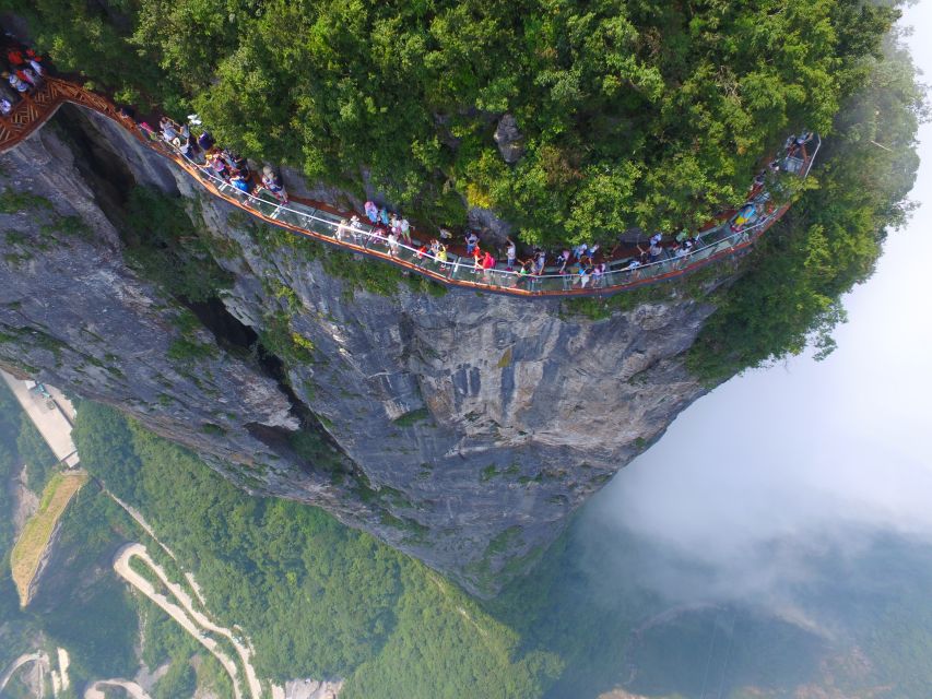 Private Day Tour to Tianmen mountain & Sky walk&Glass Bridge - Skyways glass walk: shoe covers, narrow footing, and photo control
