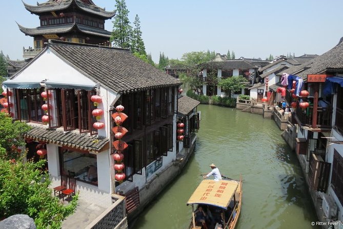 Private Full Day Tour: Zhujiajiao Ancient Water Town with Best of Shanghai - Snacking Your Way Through Old Streets: Zongzi, Zha Rou, and Candy Stops