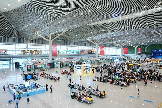 Private High-speed Train Arrival Transfer: Xi'an Bei (North) Station to Hotel - The Ride to Downtown Xian: Air-Conditioned Comfort and Timing