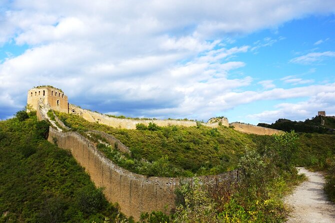Private Hiking Adventure at the Gubeikou Panlongshan Great Wall - Entering the wall hike: reservoir start and a dirt-track ascent