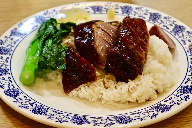 Private Hong Kong's Hidden Eats Food Tour with 7+ Local Tastings - The guide experience: friendly, organized, and built around your questions