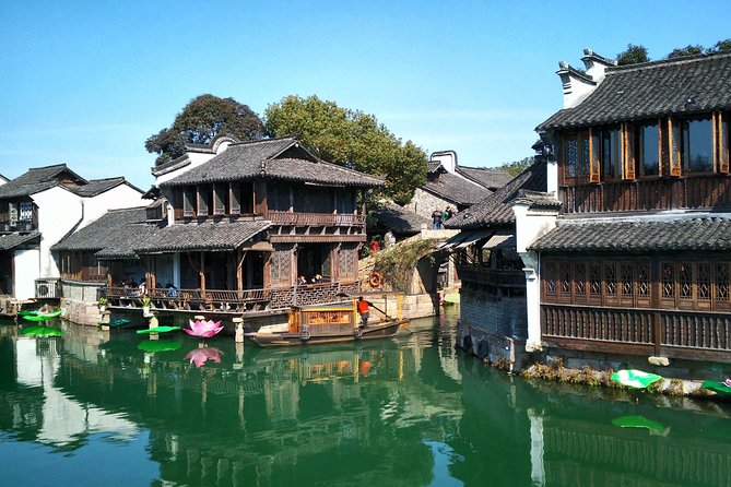 Private Round Transfer to Wuzhen &Xitang Water Town from Shanghai - Wuzhen Morning Walks: Bridges, Ming-Era Streets, Photos, and a Canal Boat