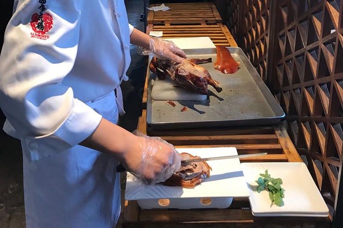 Private Tour to Pearl Market Acrobatic Show & Peking Duck Dinner - Kung Fu show at 7:30pm, choosing seats you can actually see