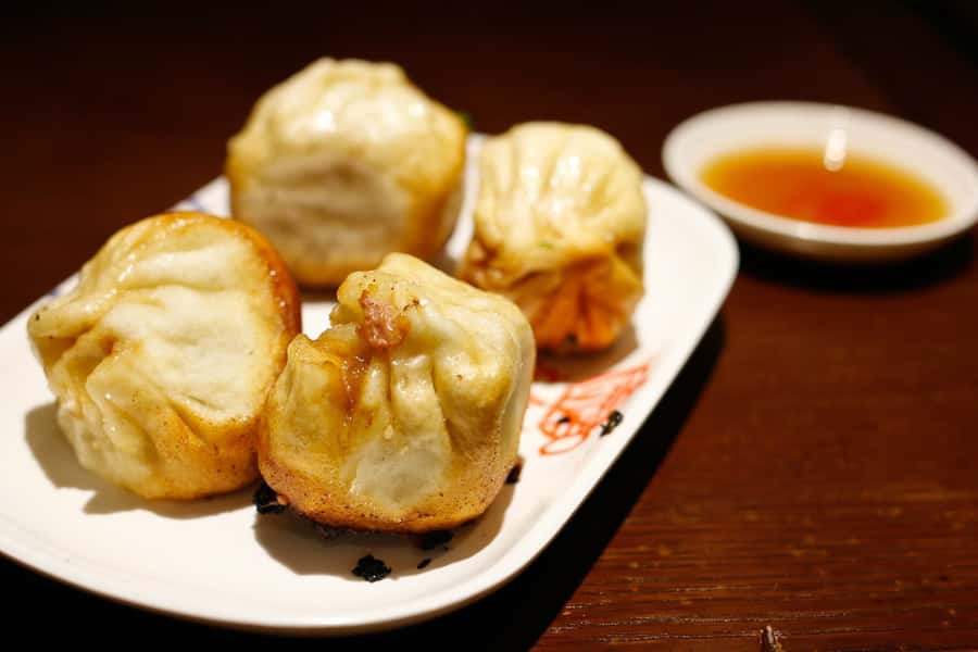 Shanghai: 3-Hour Local Food Tasting Tour - Stop One: Xintiandi Soup Dumplings That Set the Standard
