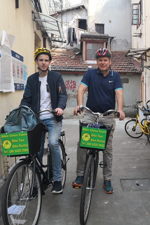 Shanghai: Guided Bicycle Tour - Street food stalls and antique stores: browsing with a guide’s context