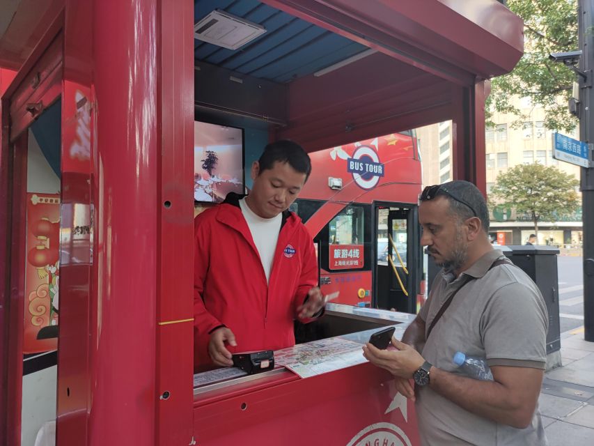 Shanghai: Hop-on Hop-off Bus Ticket and Optional Attractions - Blue Route through Pudong: Oriental Pearl to modern tower icons