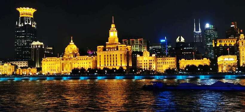 Shanghai Night River Cruise VIP Seat with Authentic Dinner - The guide’s job: turning skyline names into real stories