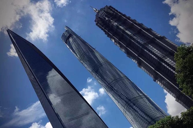Shanghai Private Day Tour of Pudong New Area including Oriental Pearl Tower - Oriental Pearl Tower Transparent Observatory views, then straight into the day