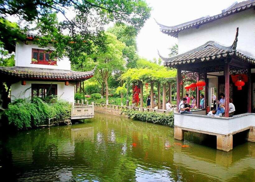 Shanghai: Zhujiajiao Private Tour w/ Boat Ride & Garden - The tallest bridge stop: your first real view of Ming and Qing Zhujiajiao