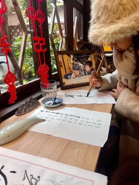 Shanghai: Zhujiajiao Water Town with Calligraphy Experience - Walking Zhujiajiao’s old lanes, stone bridges, and canal views