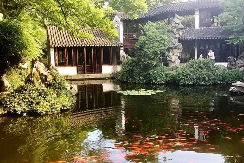 Suzhou and Tongli Water Town Private Day Trip from Shanghai - Shantang old street: the Jiangnan lane with bridges, lanterns, and costumes