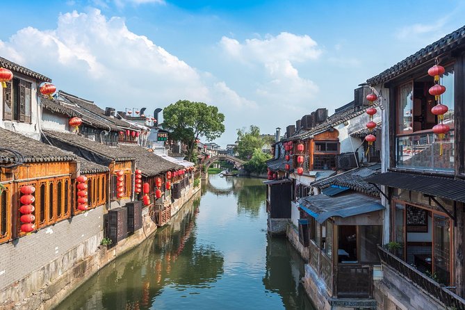 Wuzhen and Xitang Water Town Private Full Day Trip from Shanghai with Lunch and Dinner - Wuzhen Water Town: Cobblestones, Bridges, and a Real Canal Moment