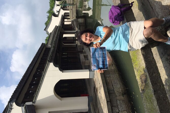 Wuzhen Water Town Delight Tour With Riverside Lunch Experience - Price and What You Get for $151 Per Person