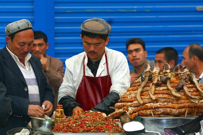 Xinjiang Best Classic Silk Road Tour with Locals - Across the Taklamakan: desert highway realism and a 5th-century relic stop