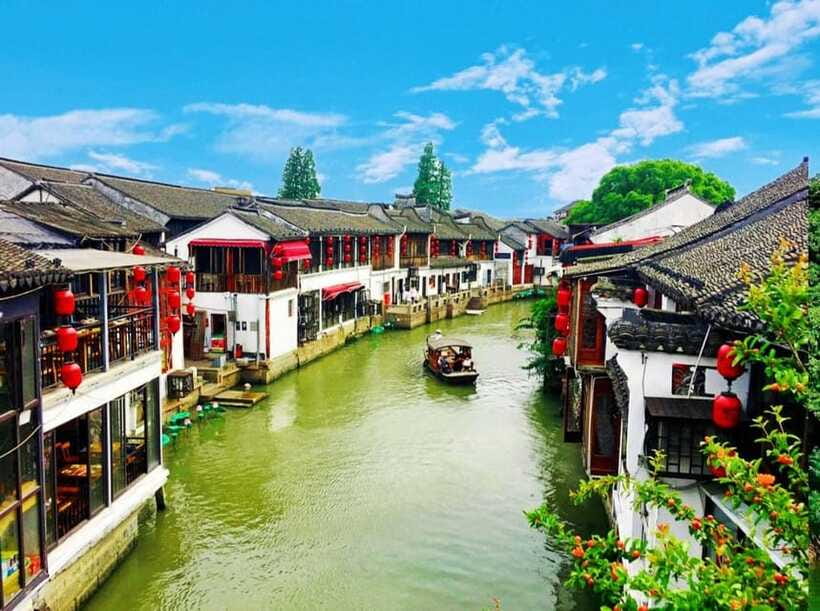 Zhujiajiao Water Town Private Tour with Night River Cruise - The Water Market Walk: Crafts, Street Art, and Eating Smart